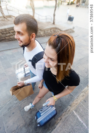 Couple going the historic city center 37869548