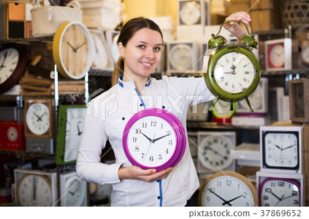 woman is holding clock 37869652