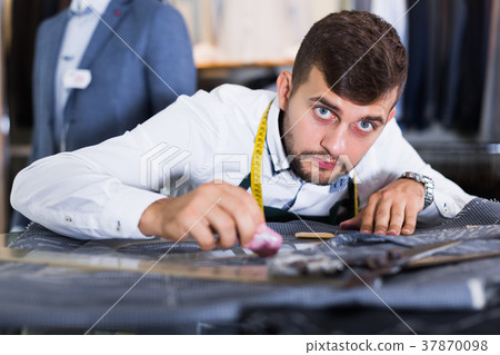 guy snipper in modern workshop 37870098
