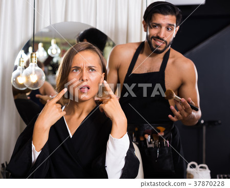 professional makeup artist with female shocked 37870228