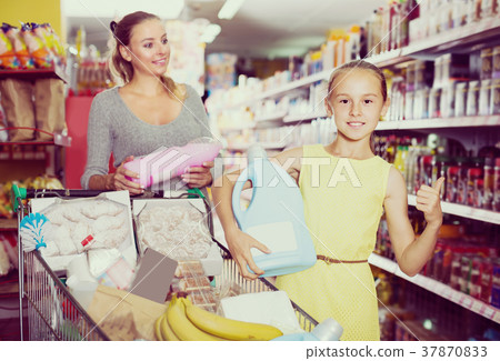 Woman with teenage girl are satisfied after shopping Woman with teenage girl are satisfied after shopping 37870833