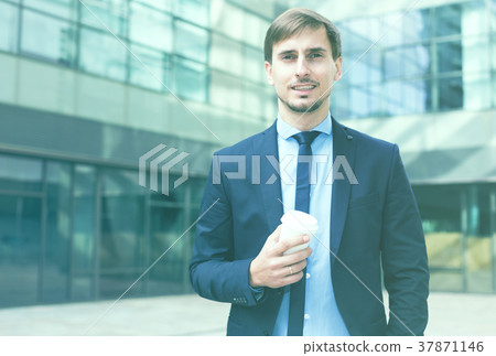 Portrait of cheerful male standing outdoor Portrait of cheerful male standing outdoor 37871146
