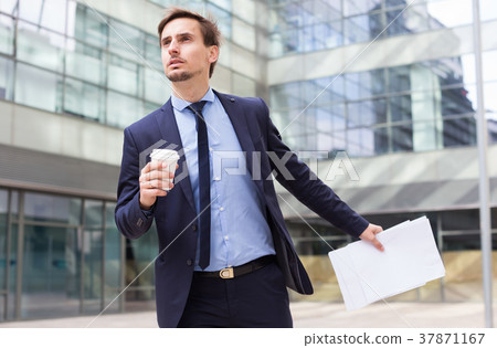 man with documents hurrying to meeting man with documents hurrying to meeting 37871167