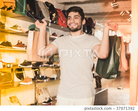 male holding paper bags male holding paper bags 37871392