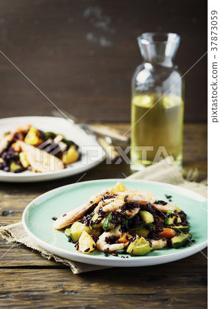 Black rice with prawns, vegetables and orange Black rice with prawns, vegetables and orange 37873059