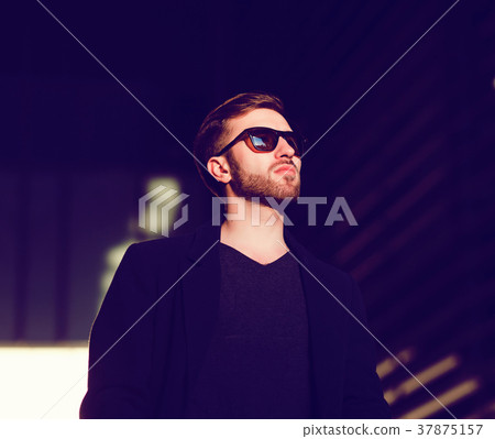 Fashion man in urban setting Fashion man in urban setting 37875157
