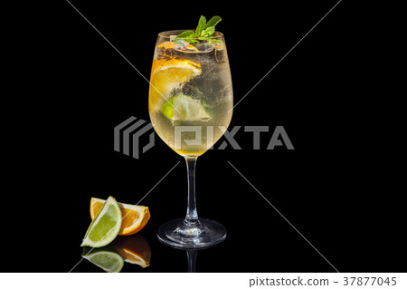 Alcoholic orange juice on a black background. 37877045