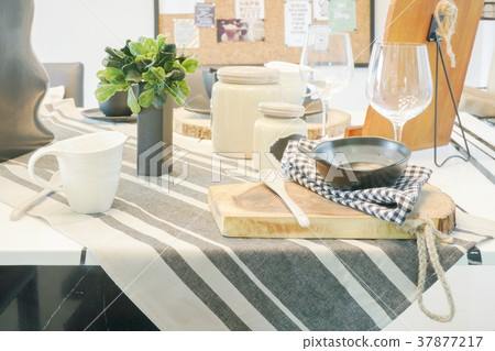 bowl and wooden cutting plate on dining table bowl and wooden cutting plate on dining table 37877217