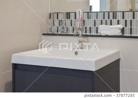 Lavatory and accessories with mosaic tile Lavatory and accessories with mosaic tile 37877285