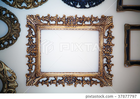 Empty frames on wall 37877797