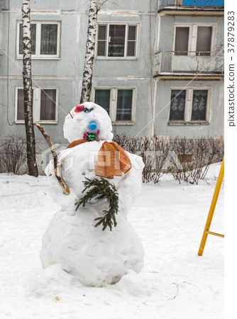 Snowman in yard Snowman in yard 37879283