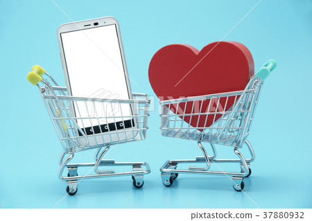 Shopping cart red heart and smartphone 37880932