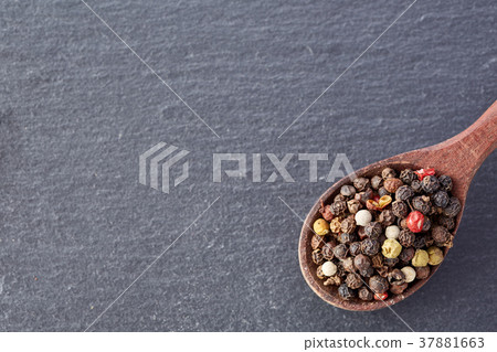 Chinese pepper, Sichuan pepper in wooden spoon on 37881663
