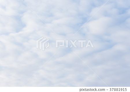 Calm sunset clouds and blue sky 37881915