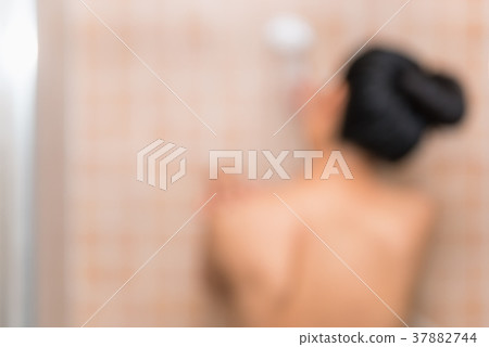 Abstract blurred of woman shower in the bathroom Abstract blurred of woman shower in the bathroom 37882744