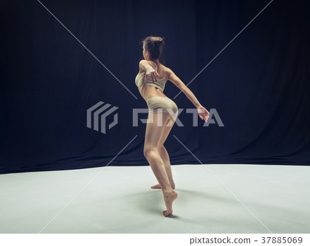 Young teen dancer ion white floor background. Young teen dancer ion white floor background. 37885069