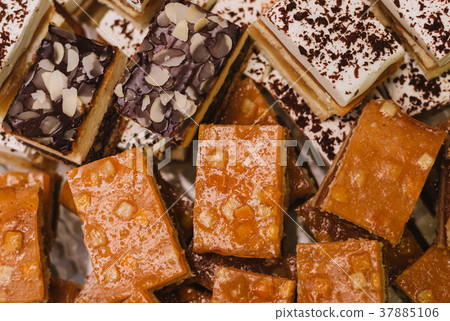 sweets and cake on the wedding table 37885106