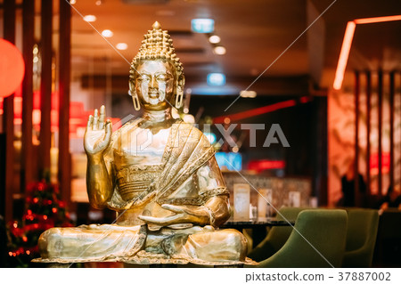 Statue Of Buddha Sitting In Lotus Position With Statue Of Buddha Sitting In Lotus Position With 37887002