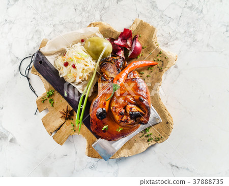 Roasted pork knuckle eisbein with braised boiled cabbage 37888735