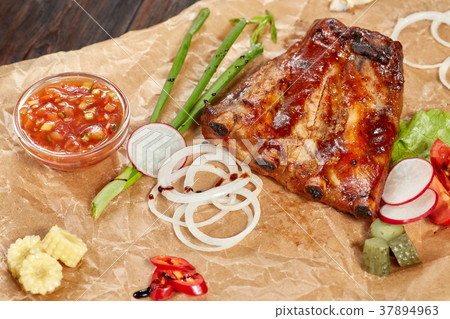 图库照片: grilled pork ribs, sweet and sour sauce