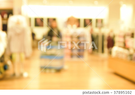 blurred image people walking in shopping centre. blurred image people walking in shopping centre. 37895102
