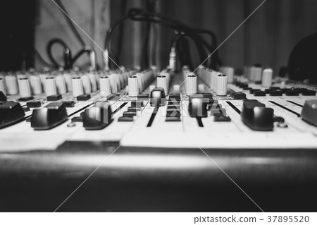 Mixing console at the concert Mixing console at the concert 37895520