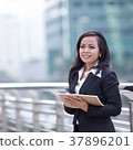 Portrait of a young business woman smiling 37896201