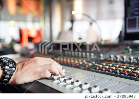 Mixer sound control concept. Hand control button 37896948