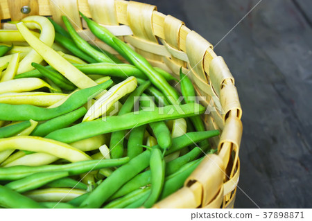 Green beans close up top view. Green beans close up top view. 37898871