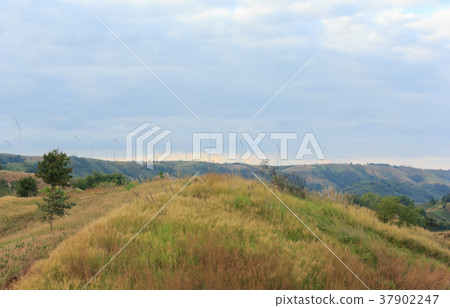 Wind turbines on mountain. 37902247