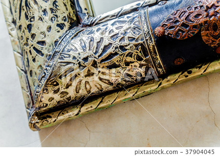 Metal  frame on a traditional Moroccan wall 37904045