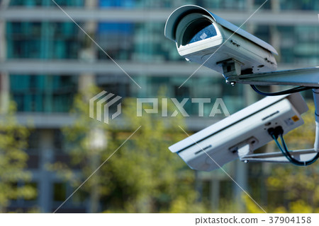 CCTV camera blury business building on background 37904158