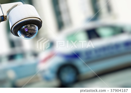 CCTV camera urban video with blur police car 37904187