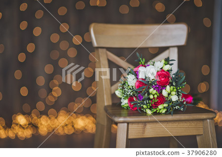 A bouquet of flowers on a background  37906280