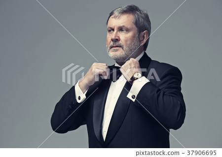 Middle aged male adult wearing a suit isolated on Middle aged male adult wearing a suit isolated on 37906695