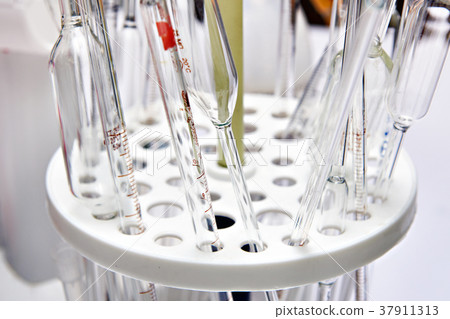 Measuring glass tubes experiences in laboratory Measuring glass tubes experiences in laboratory 37911313