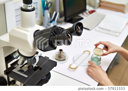 Workplace with microscope in laboratory 37911333
