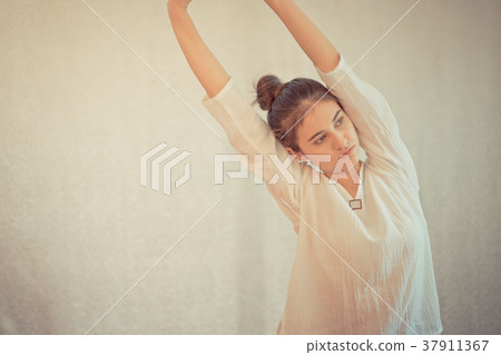 Woman is stretching out in Thai Massage spa Woman is stretching out in Thai Massage spa 37911367