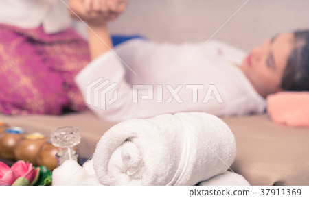 Woman getting massaged with spa equipment 37911369