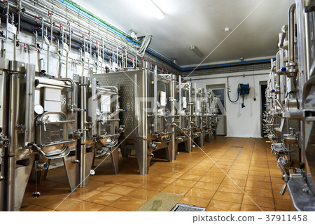 Metal tanks for aging wine at winery Metal tanks for aging wine at winery 37911458