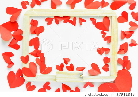 red paper shaped heart around whiteboard 37911813