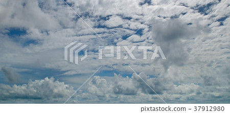 clouds slowly flying in the sky.Wide photo. clouds slowly flying in the sky.Wide photo. 37912980