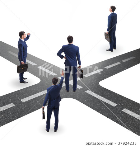 Young businessman at crossroads in uncertainty 37924233