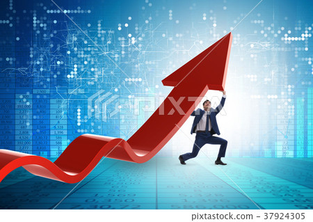 Businessman supporting growtn in economy on chart Businessman supporting growtn in economy on chart 37924305