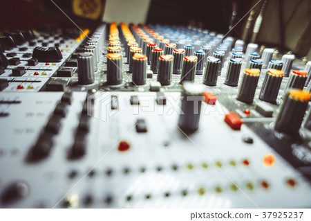Mixing console at the concert Mixing console at the concert 37925237