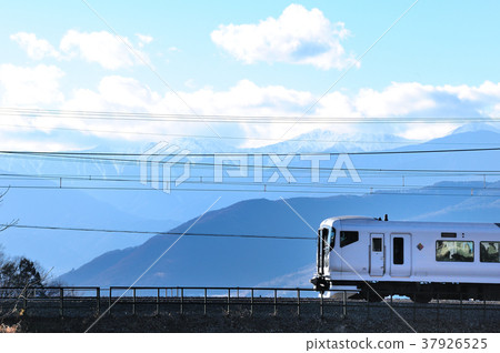 E257 series Limited Express Azusa, which goes Chuo Line against the background of the Southern Alps E257 series Limited Express Azusa, which goes Chuo Line against the background of the Southern Alps 37926525