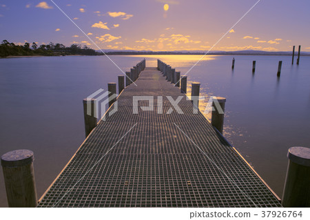 Pier on the water in the town of Swansea. 37926764