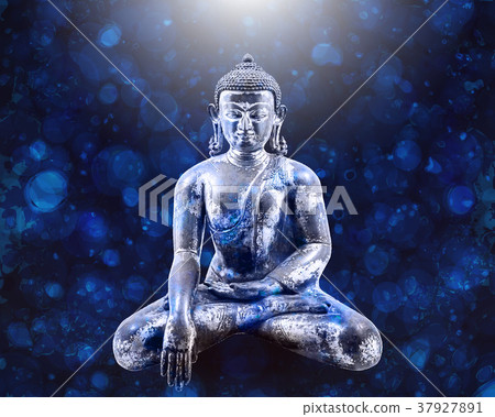 Sitting Buddha over blue background. 37927891
