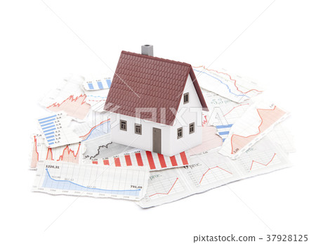 Small house on newspaper charts 37928125