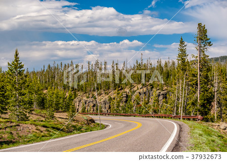 Highway in Yellowstone National Park Highway in Yellowstone National Park 37932673